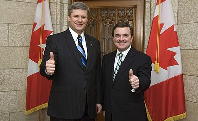 Flaherty giving the Don Cherry-salute with PM Harper