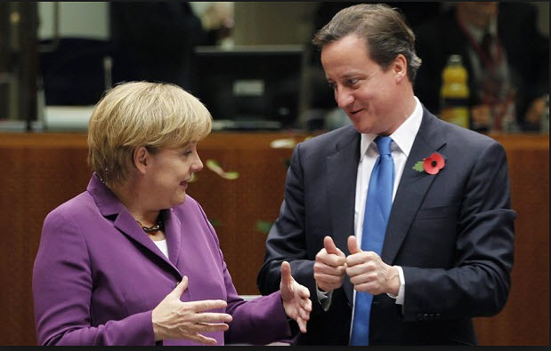 Merkel and Cameron comparing how far apart they are on the UK's labour reform demands